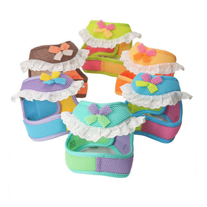 Six color options of a ruffle mesh dog harness and leash set featuring contrasting panels, decorative bows, and white lace trim.