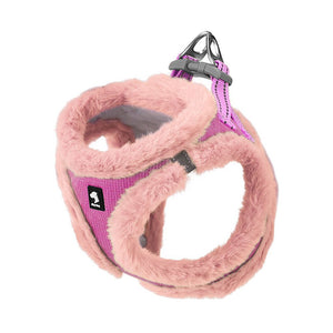 Bubblegum Pink and Coral Pink faux fur dog harness with plush trim, waffle-textured fabric and an aluminum D-ring on a white background.