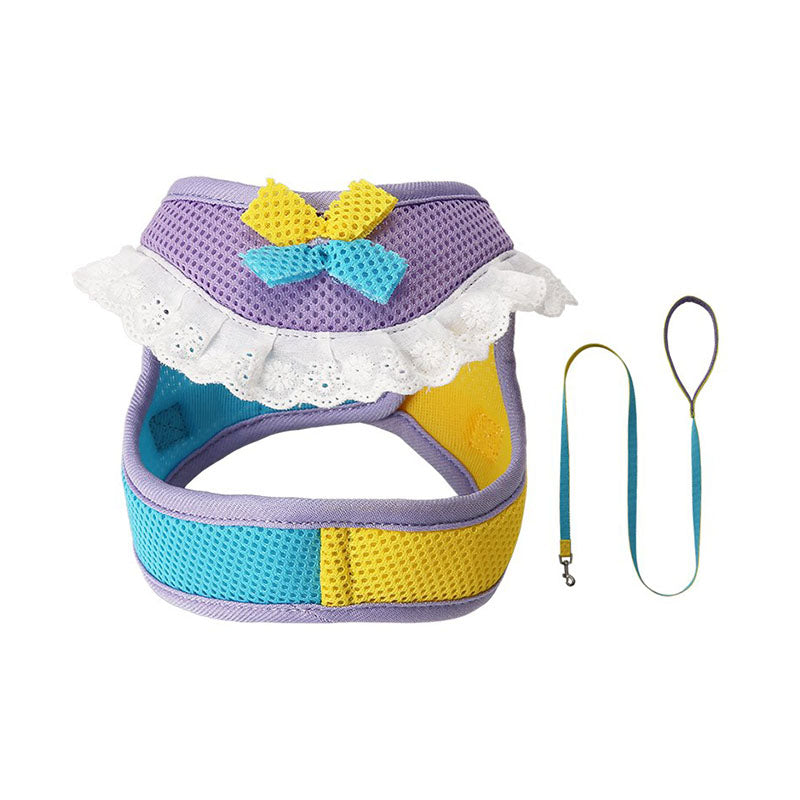 Lavender mesh dog harness and matching leash with yellow and aqua blue accents, a bow, and white lace ruffle trim.