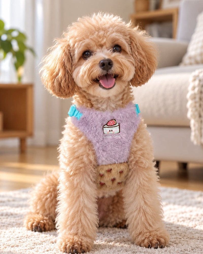 Small fluffy dog wearing a Dusty Lilac and Beige plush vest harness indoors