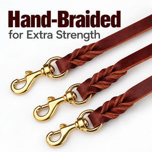 Hand-braided leather ends with brass snap hooks on a multi-dog leash coupler